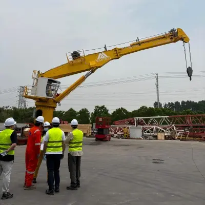 Foreign Customers Visit MAXTECH to Inspect 3t39m Telescopic Boom Crane Production
